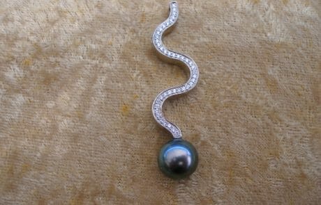 Handcrafted bronze pendant