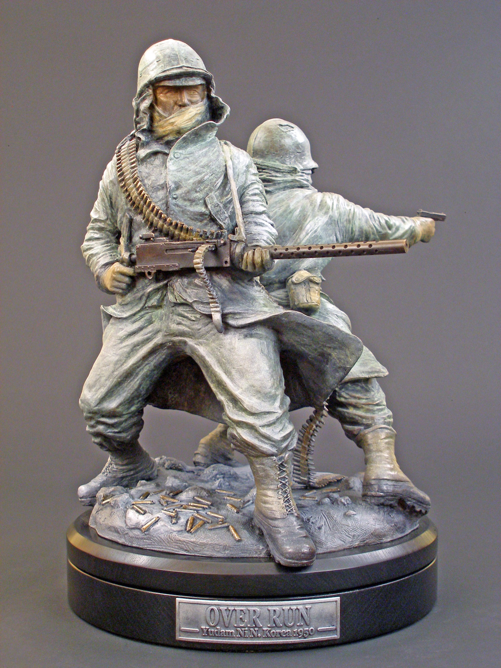 Overrun - Soldiers in intense combat, bronze sculpture